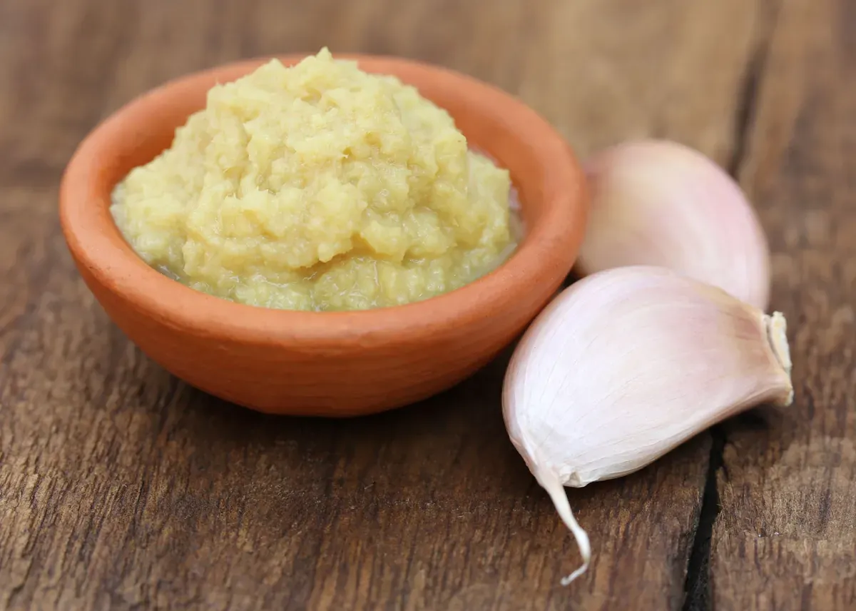 A head of garlic with loose cloves